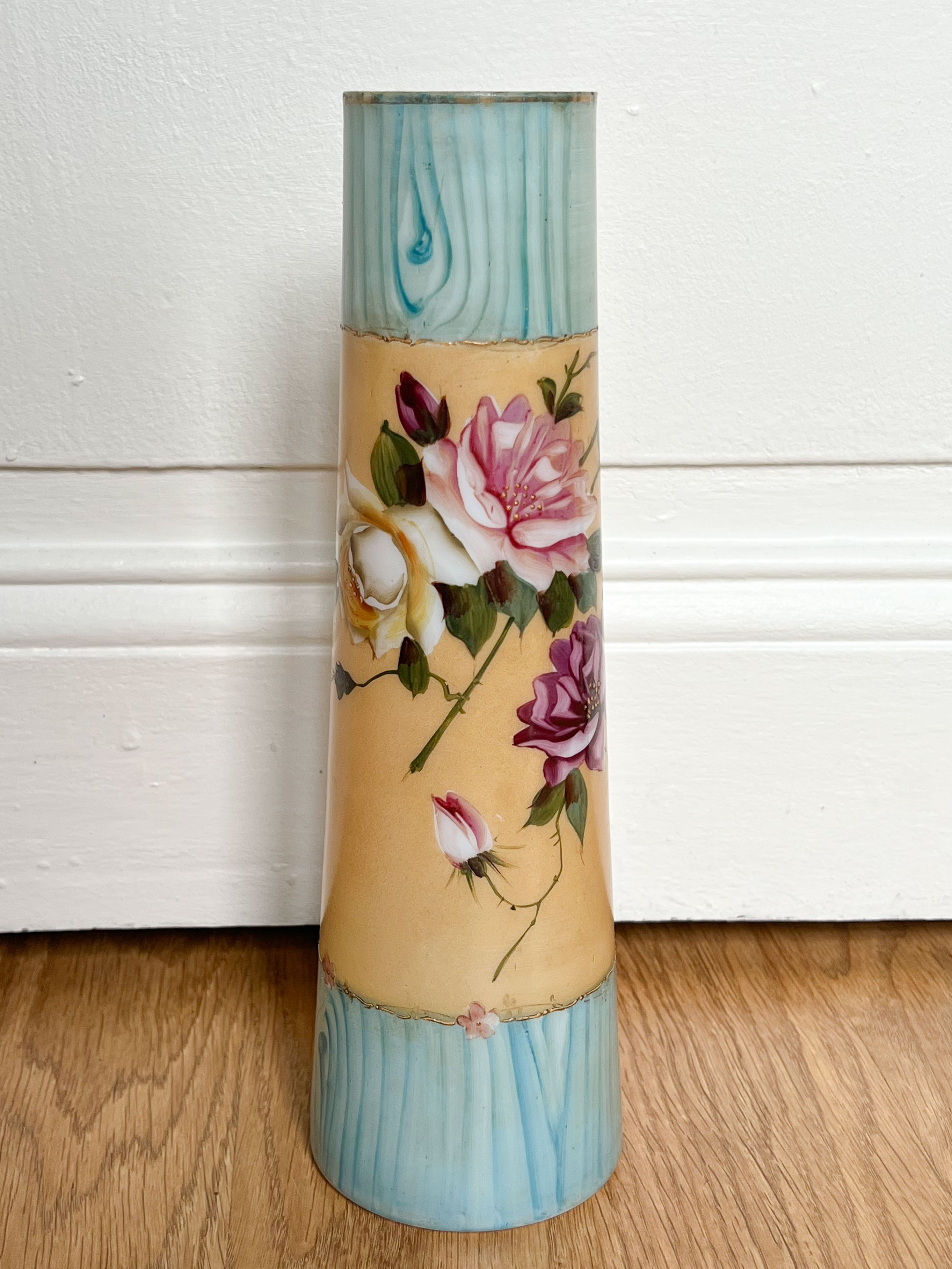 Blue and beige vase with flower pattern