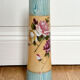 Blue and beige vase with flower pattern