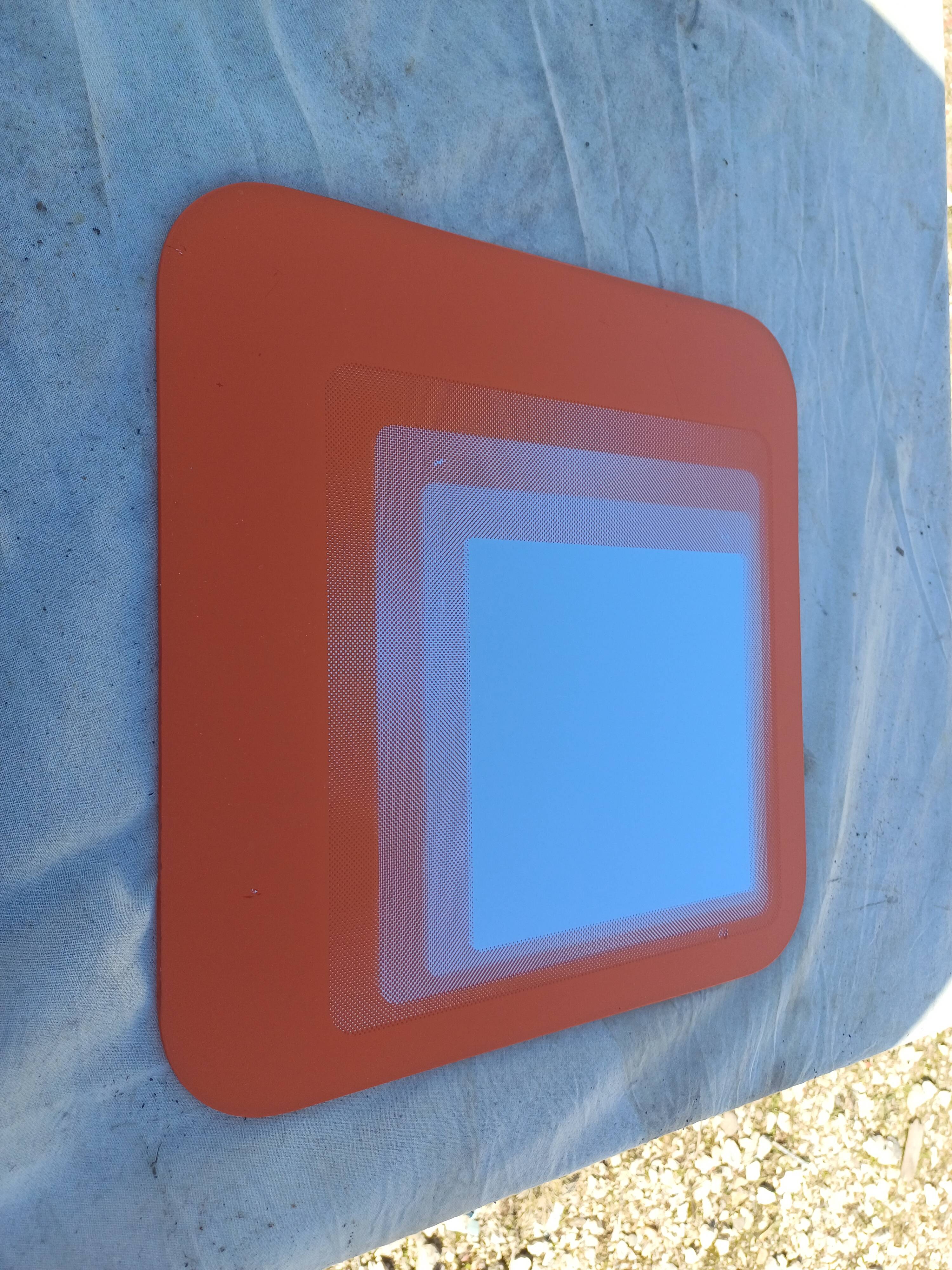 Vintage orange glass mirror