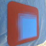 Vintage orange glass mirror