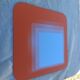 Vintage orange glass mirror