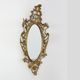 Miroir ovale en métal doré de style rococo, Italie, 20e siècle