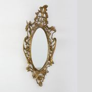 Miroir ovale en métal doré de style rococo, Italie, 20e siècle