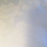 White damask tablecloth with flower pattern