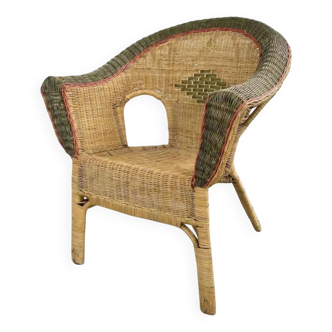 Rattan and wicker cabriolet-style armchair with green and red edging
