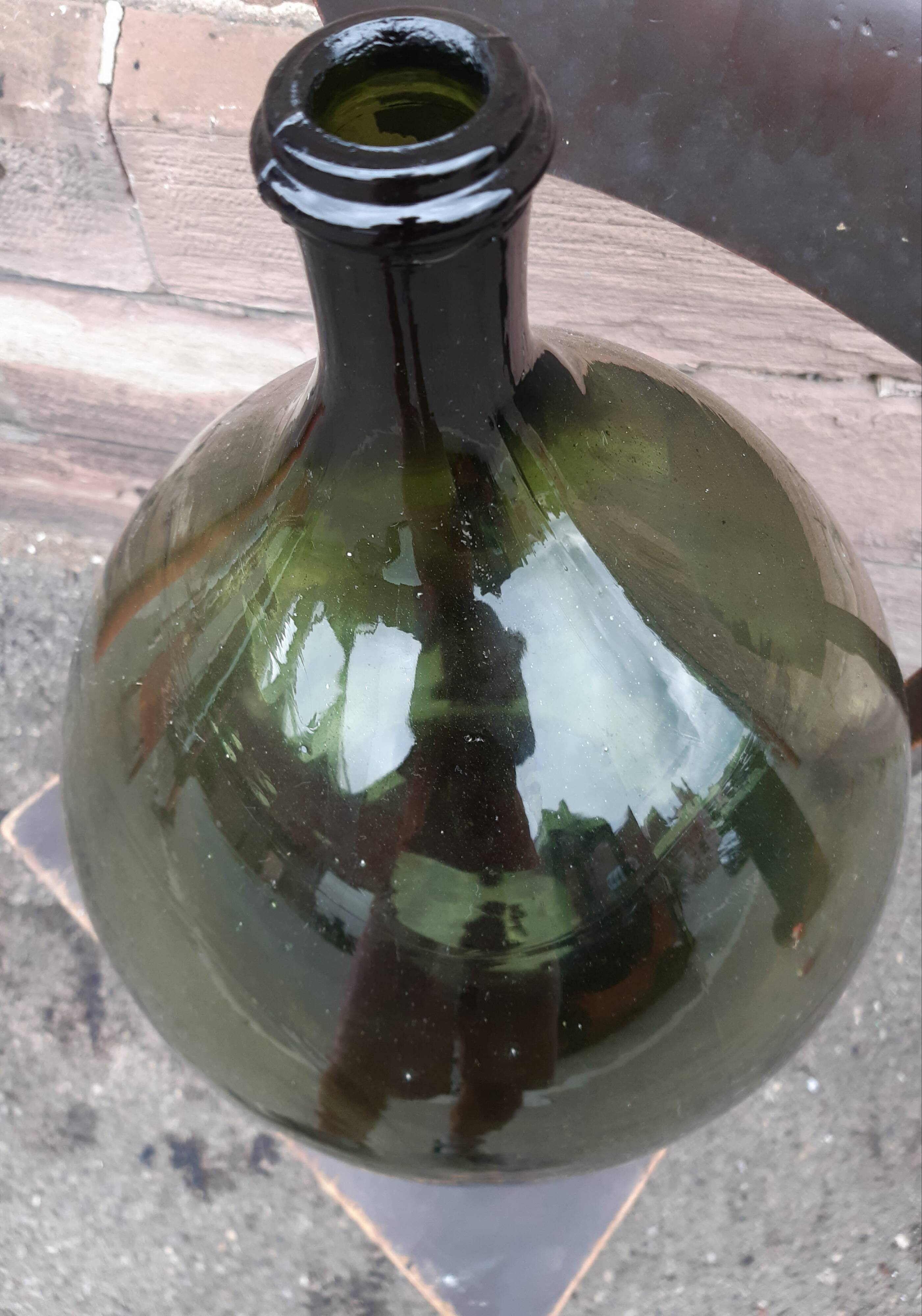 Vintage green demijohn