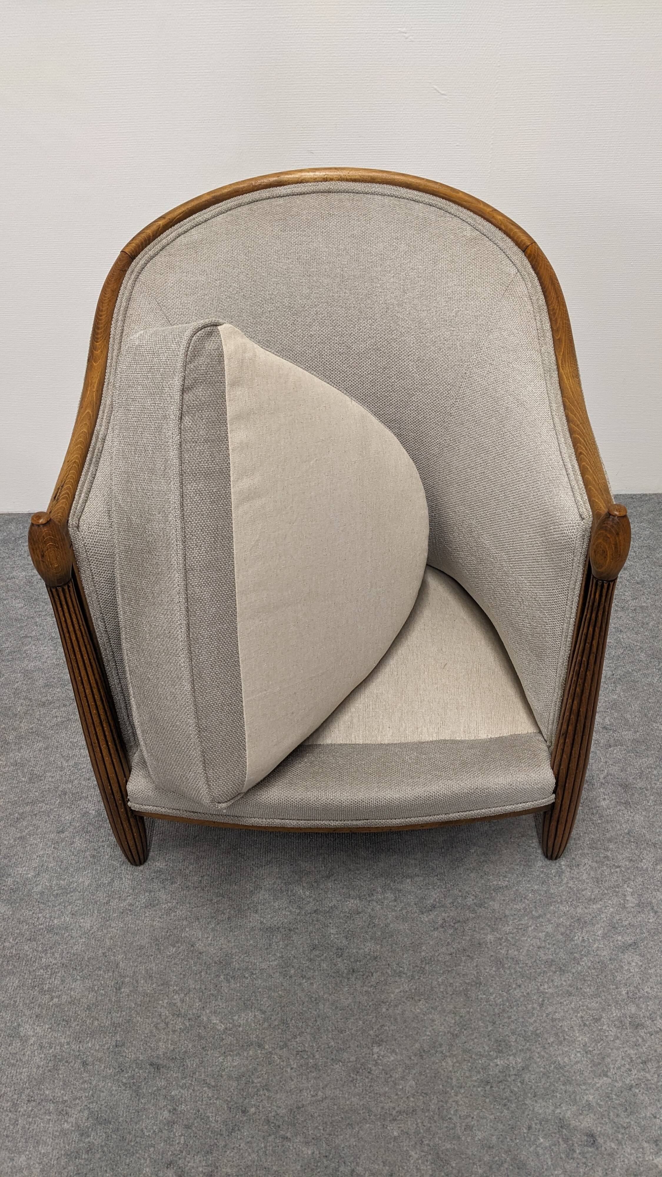 Pair of Art Deco gondola armchairs, France circa 1920