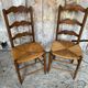 Pair of Rustic Antique Turned Wood Chairs + Woven Straw Seat Wine