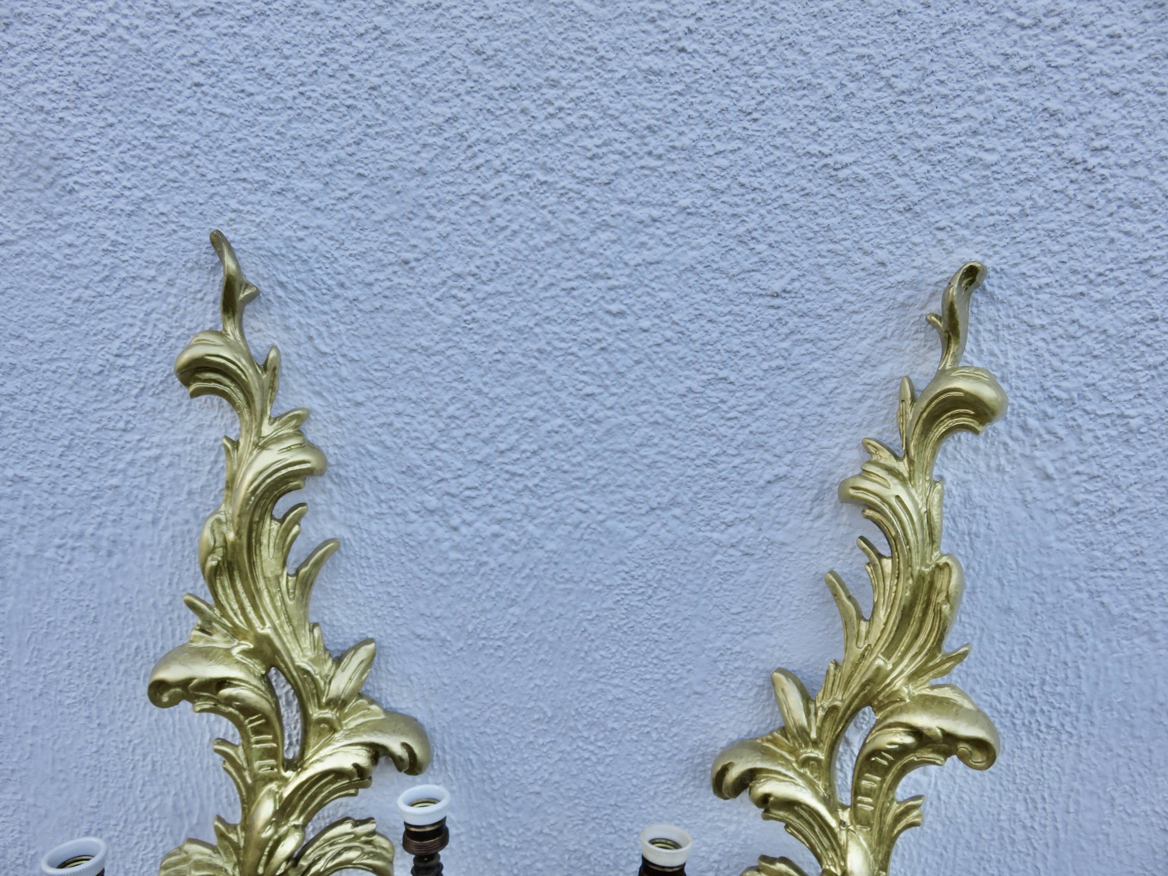 Pair of 86cm castle sconces in gilded wood from the 1940s