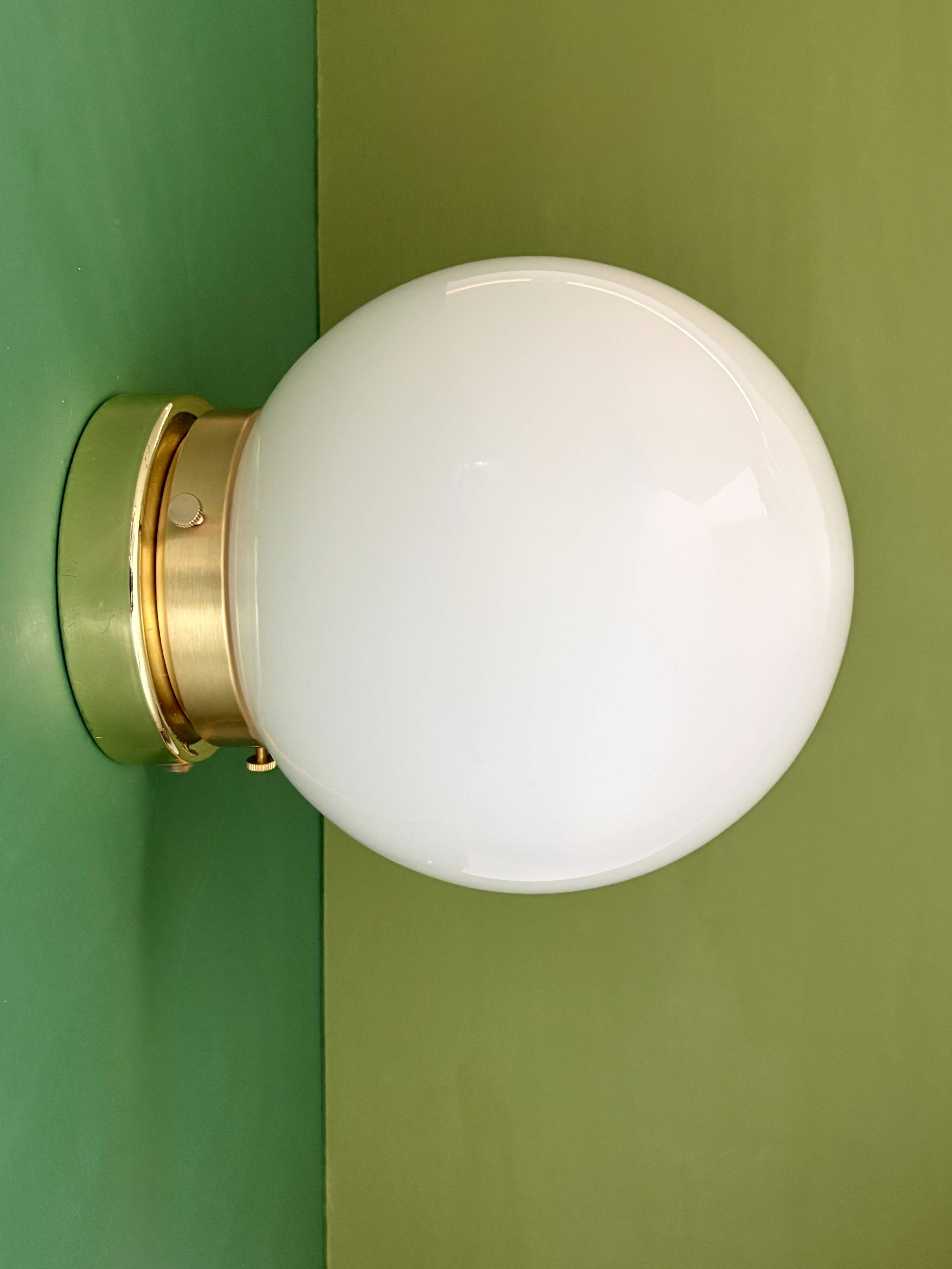 Vintage wall or ceiling light globe in white opaline.