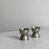 Pair of shaped metal egg cups