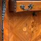 Old French secretary in bronze and wood marquetry.