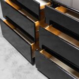 Chest of drawers in black lacquered wood of the 70