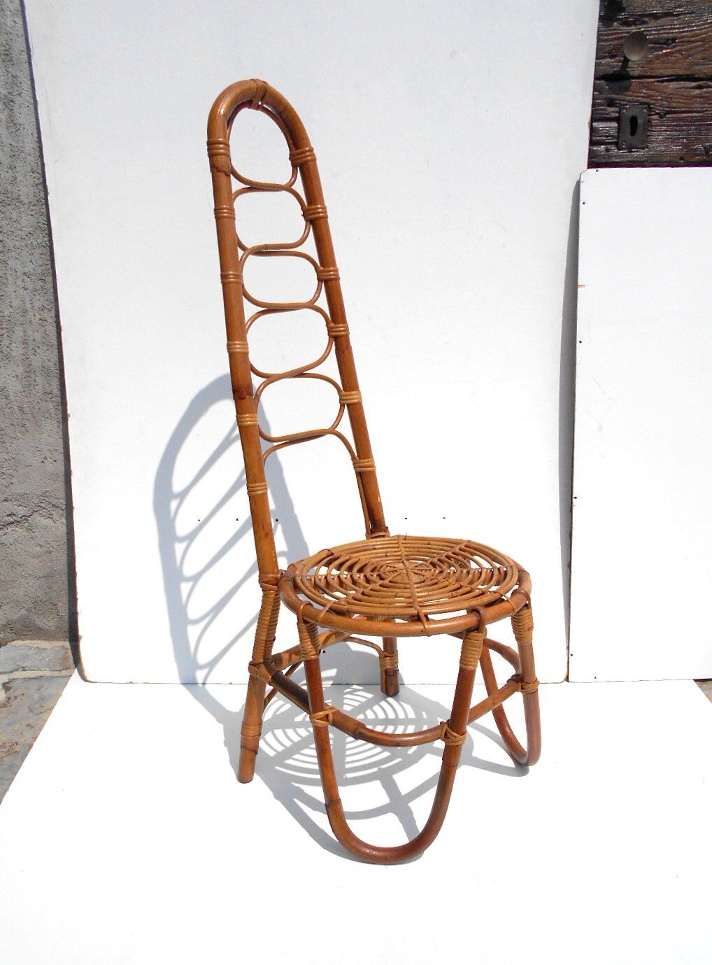 Two Dirk Van Sliedregt rattan chairs,1950s