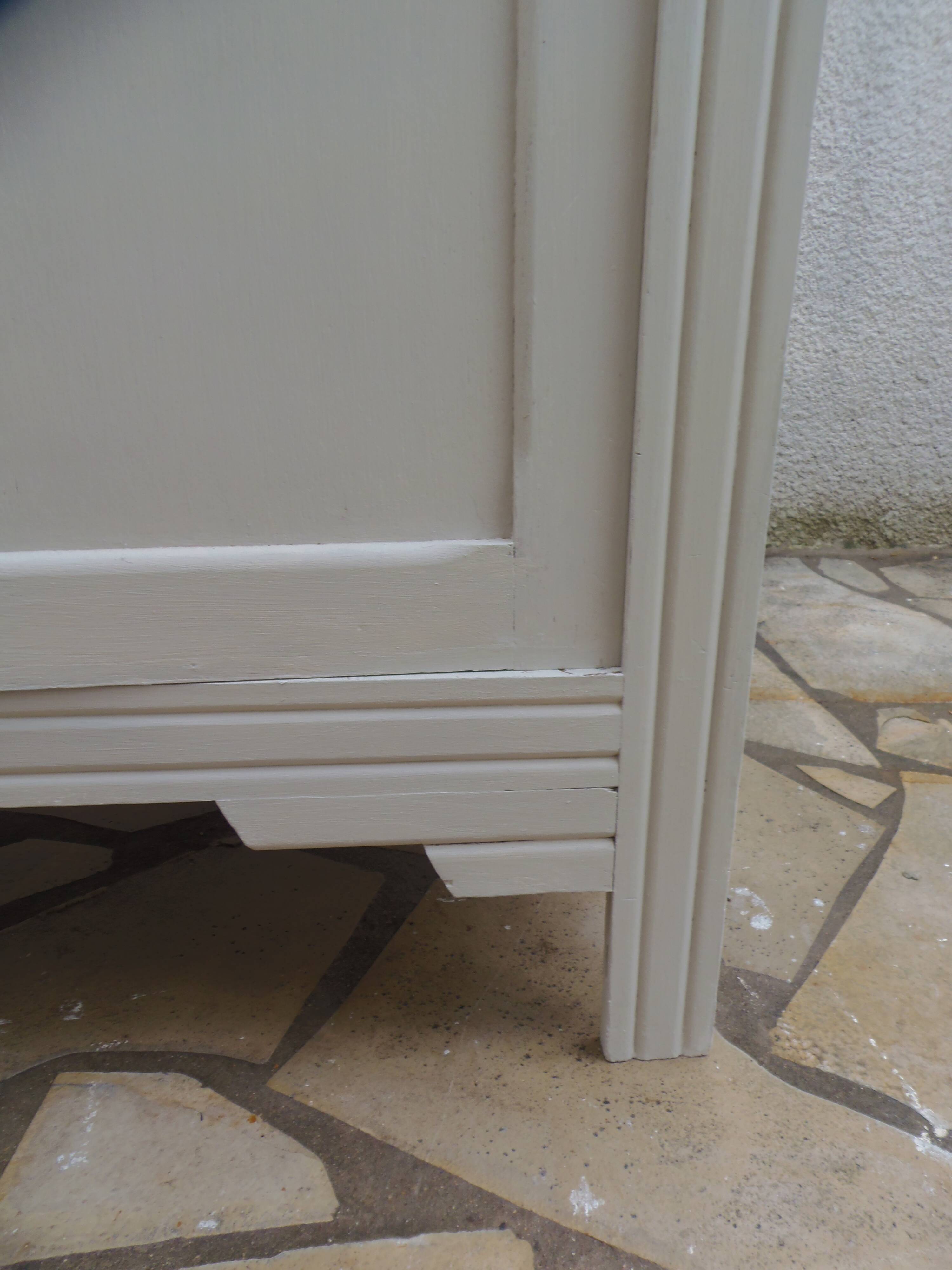 Re-enchanted Art Deco wardrobe in beige.