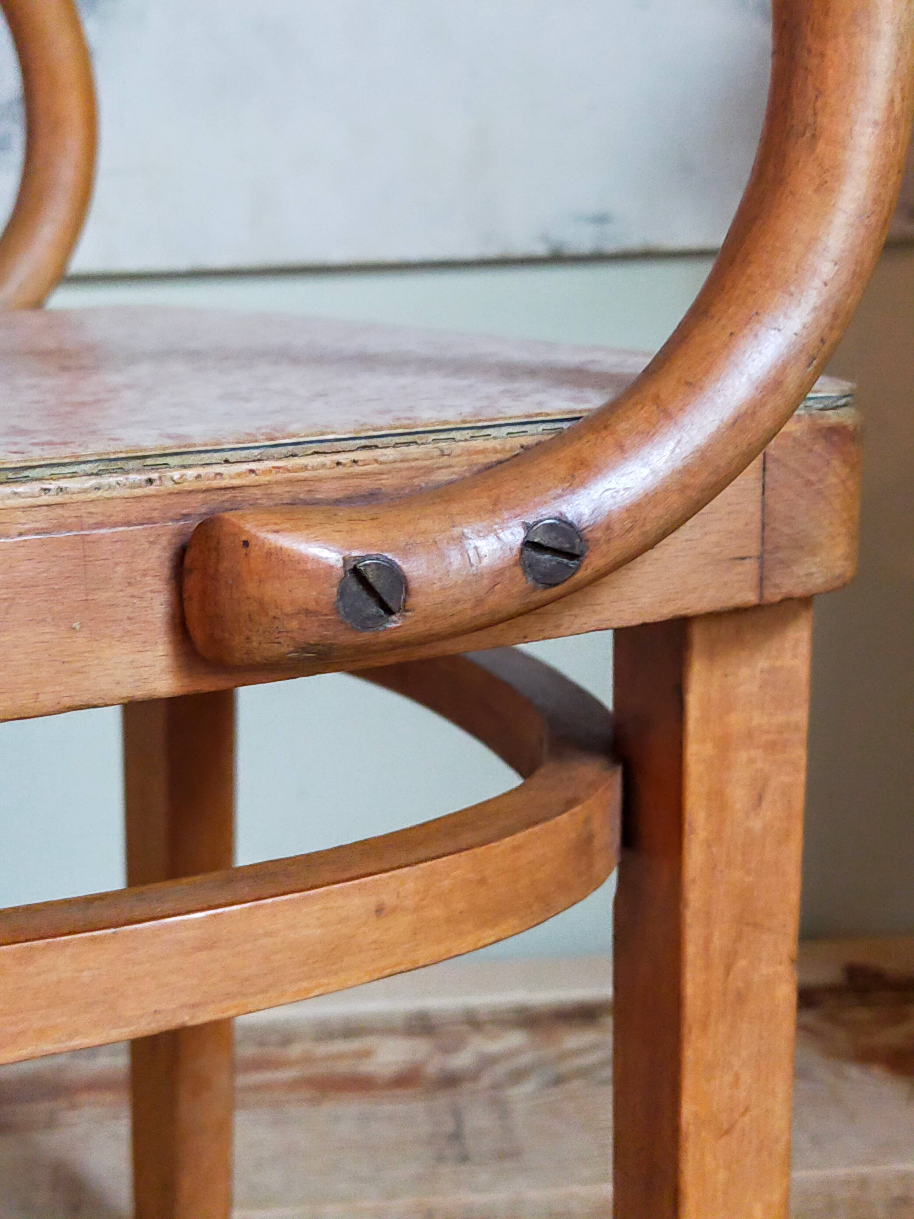 Children's armchair in old bent wood