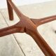 Duo of round coffee tables with a reversible top — Crossed base