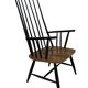 Vintage easy chair with high back and armrest from the 60s