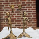 2 bougeoirs anciens chérubin en laiton