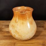 The stoneware pitcher