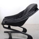 Paire de fauteuils en cuir noir, datant des années 70