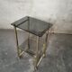 Side Table 1970s smoked glass/gold/wheels