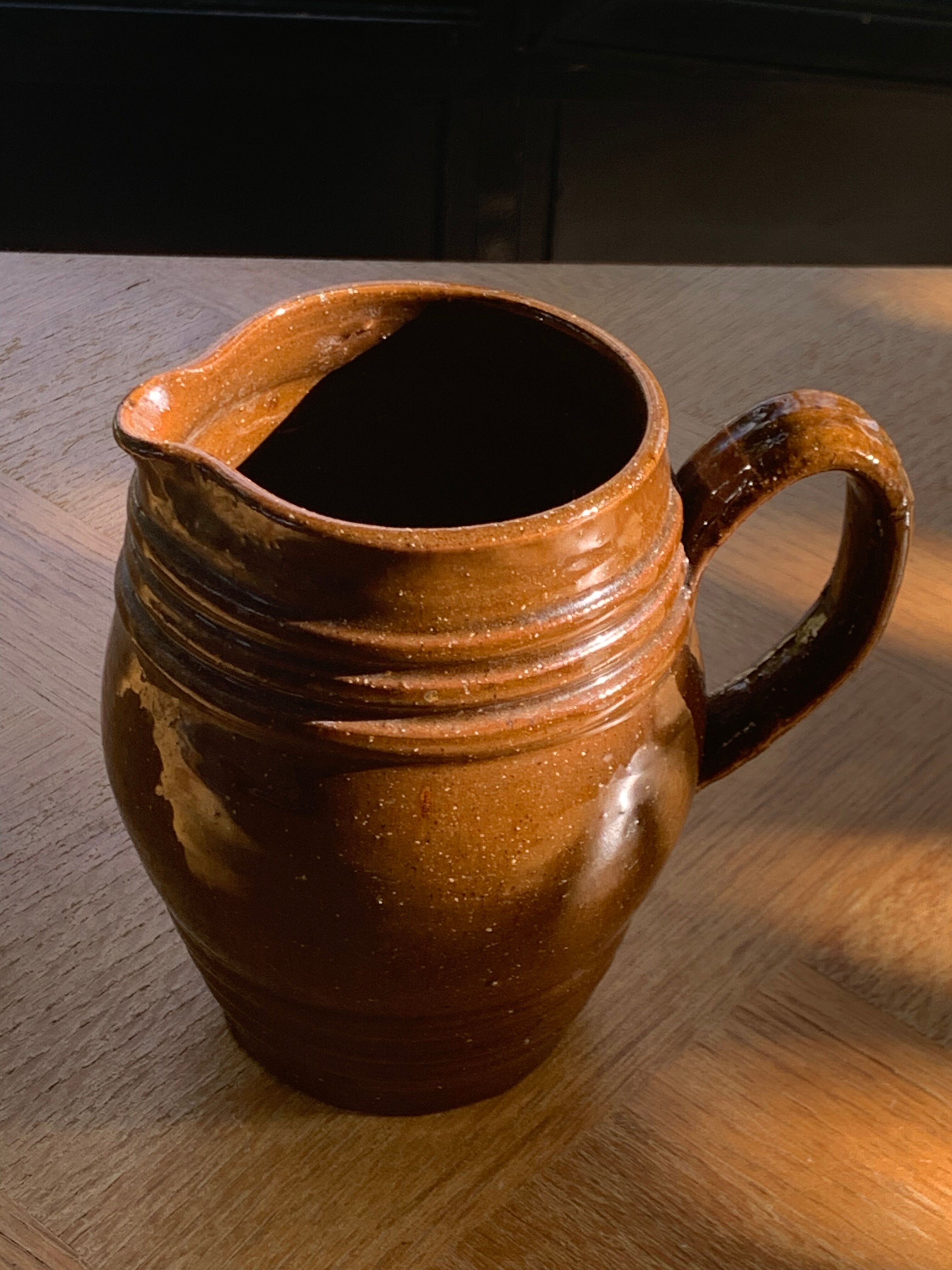 Pitcher old cider jug in glazed sandstone