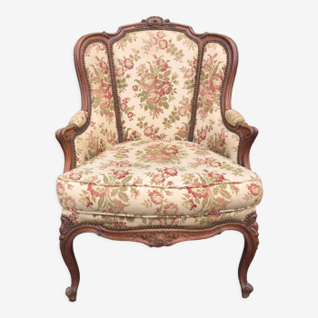 Fauteuil Louis XV dit rocaille en noyer