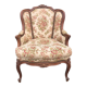 Fauteuil Louis XV dit rocaille en noyer