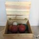 Very old game of wooden petanque balls with piglet