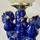 Vintage blue ceramic lamp with its birds.
