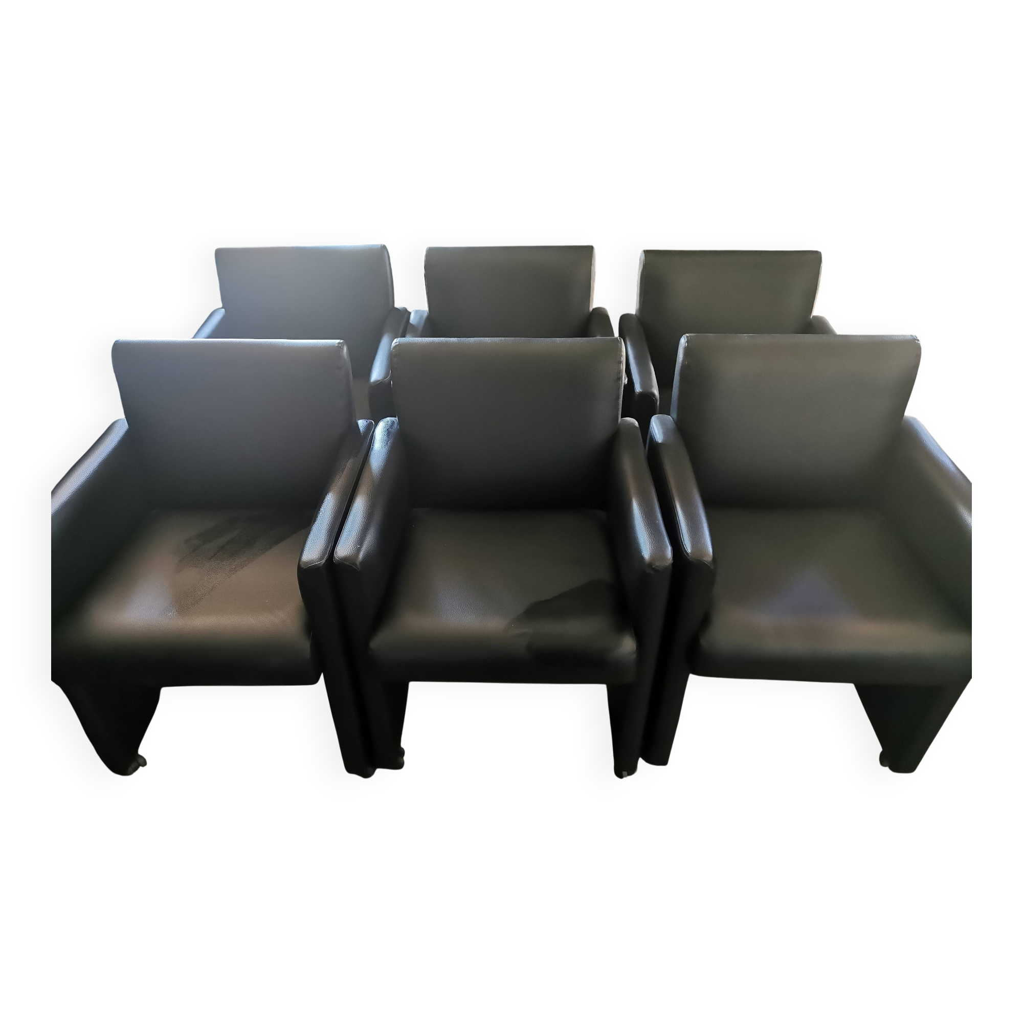 6 faux leather chairs on wheels