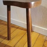 Old wooden tripod bench stool milking shepherd’s bench