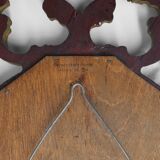 Baroque style oval wall mirror in gilded wood, France