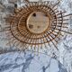 Asymmetrical rattan mirror