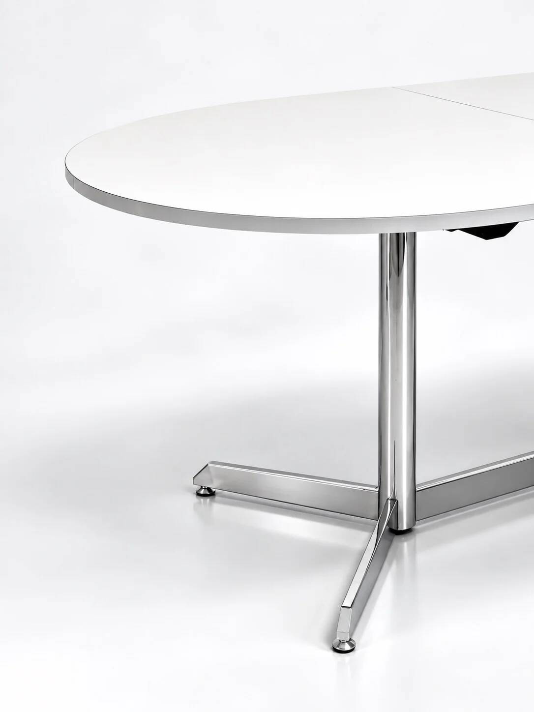 Vintage oval extendable dining table, white laminate and chrome, 1970s.