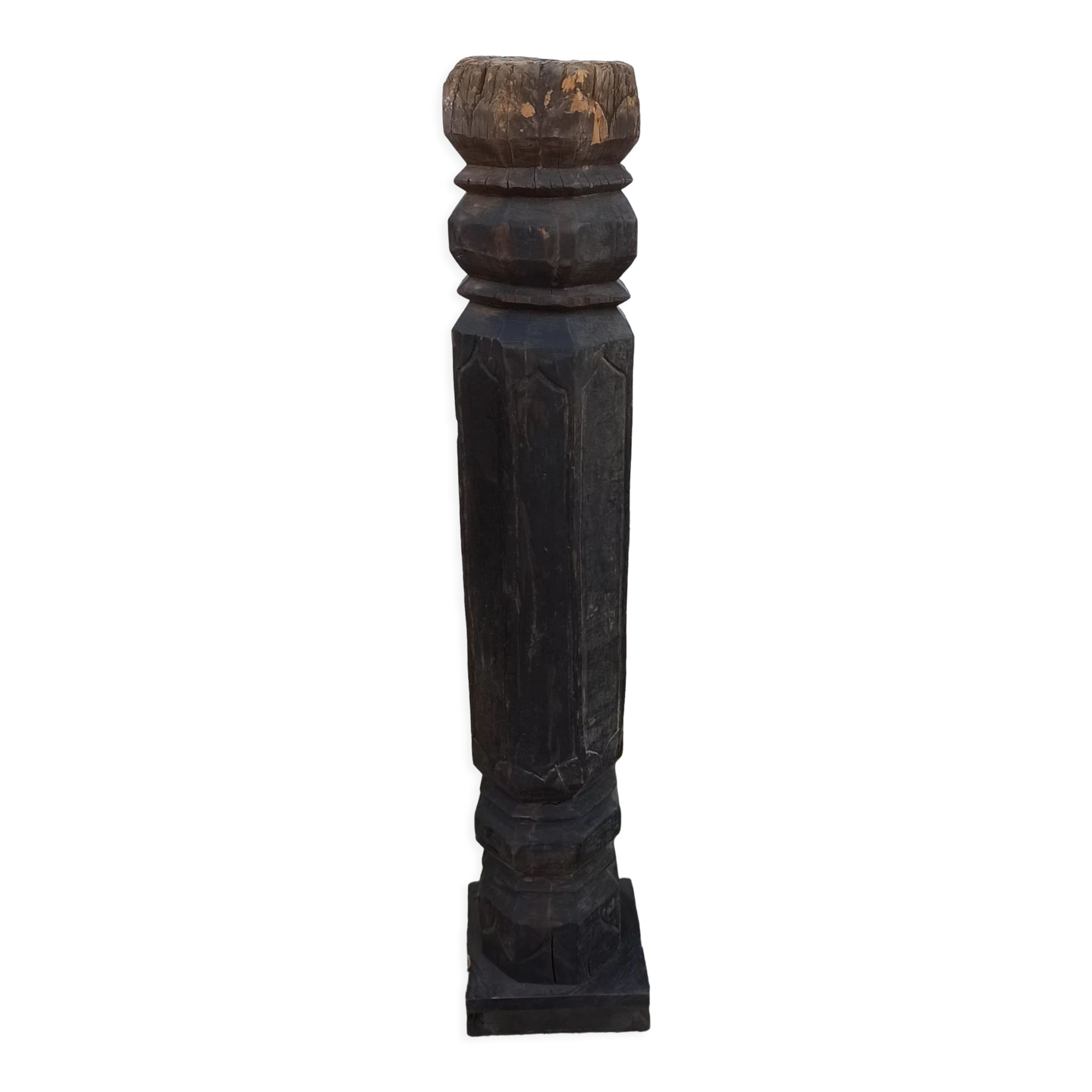 Old wooden pillar on pedestal