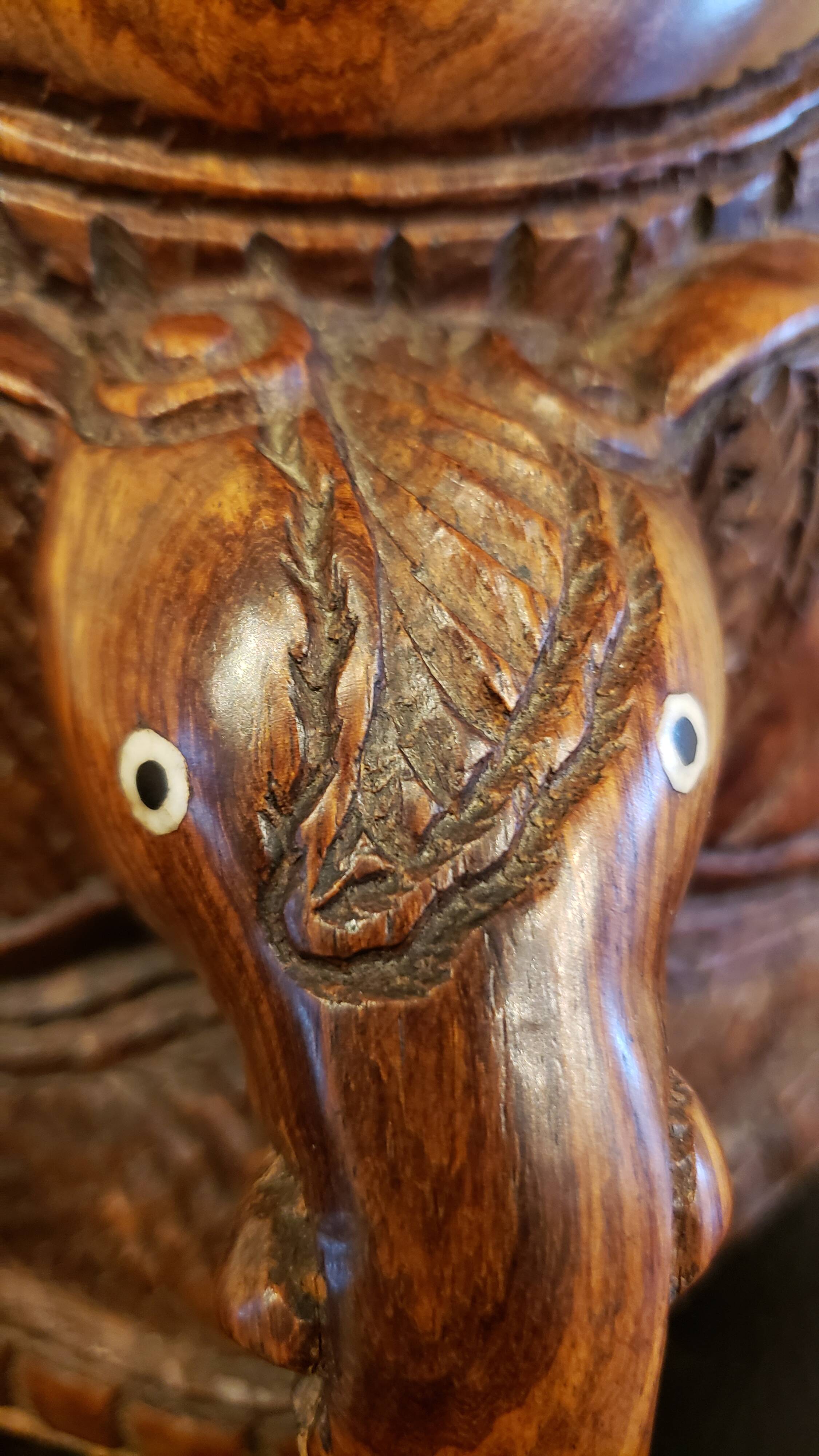 Old large African wall mask in carved wood