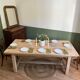 Farm table made of solid light oak wood.