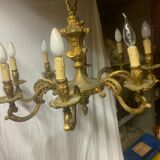 Lustre en bronze plein 8 branches