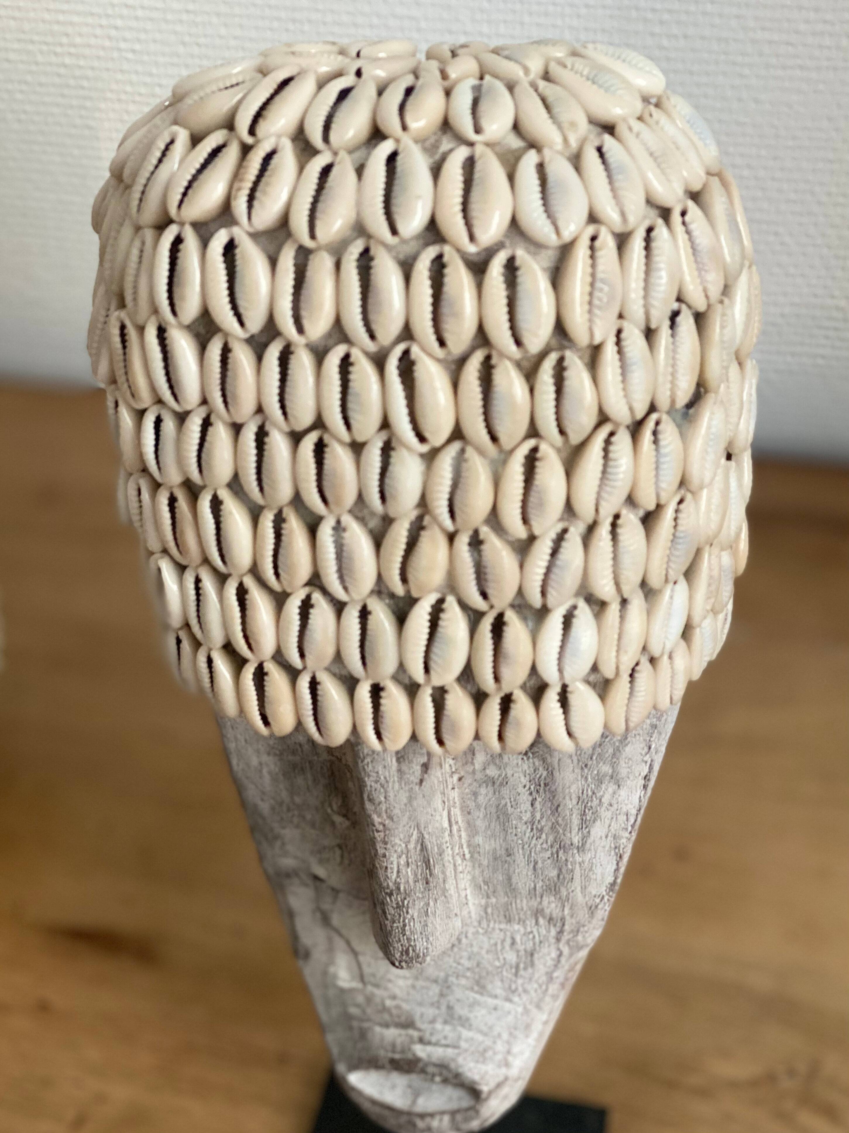 Wabi sabi face mask in aged wood and cowrie shells