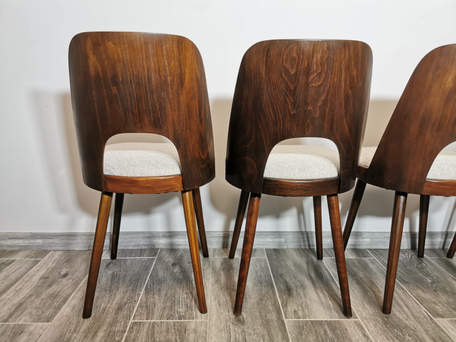 Dining chairs by Oswald Haerdtl