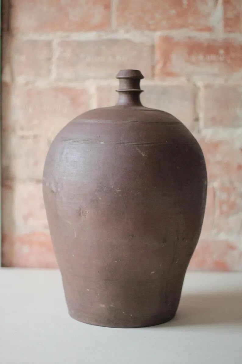 Old handled pot, antique pot, handled jar, interior decoration, collection, pottery.