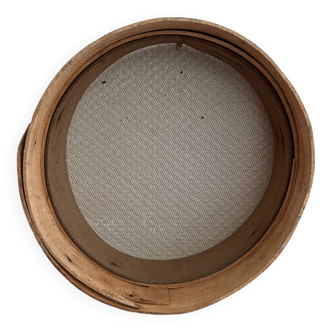 Old round wooden mason's sieve