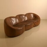 "Pumpkin" 3-seater canapé in patinated brown leather by Pierre Paulin for Arti.