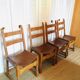 Lot de 4 chaises anciennes en bois et cuir