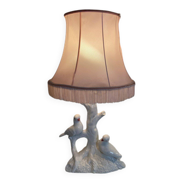 Ceramic lamp with birds, pink fringed shade, 1950s.