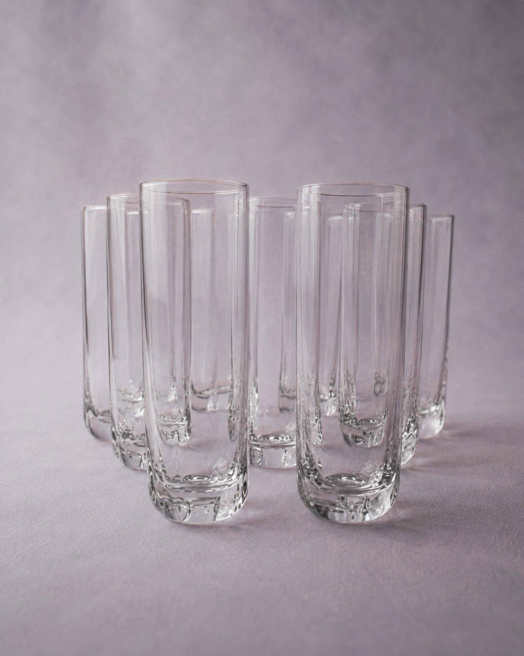 Vintage set of 9 Murano glasses from the 1980s, octagonal shape in art glass, classic Italian tableware.