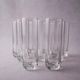 Vintage set of 9 Murano glasses from the 1980s, octagonal shape in art glass, classic Italian tableware.