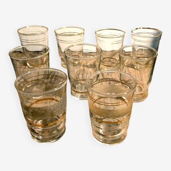 Set of 9 glasses with golden edging in blown glass